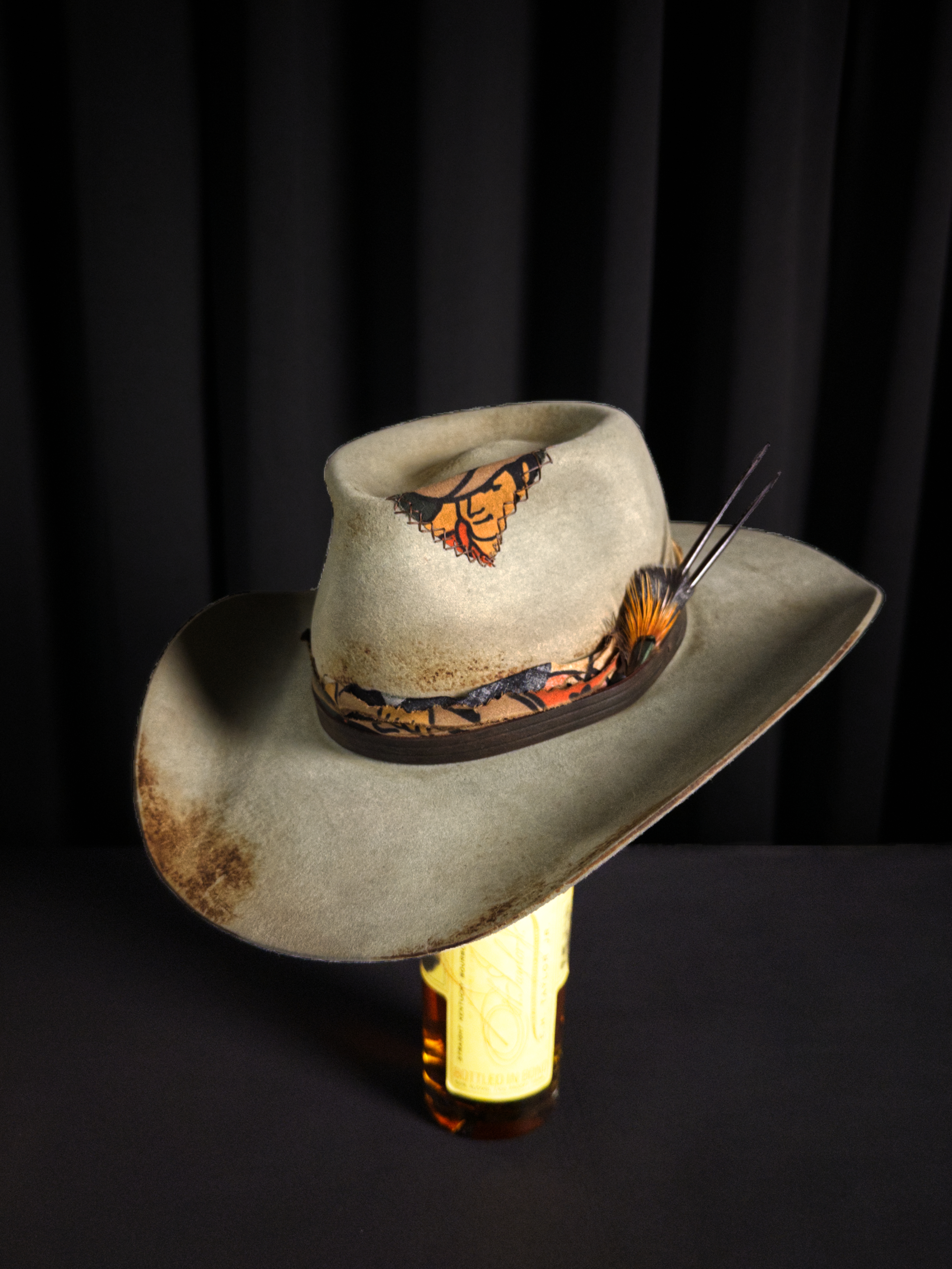 Client and designer shaping the crown and brim in real time at the mirror
