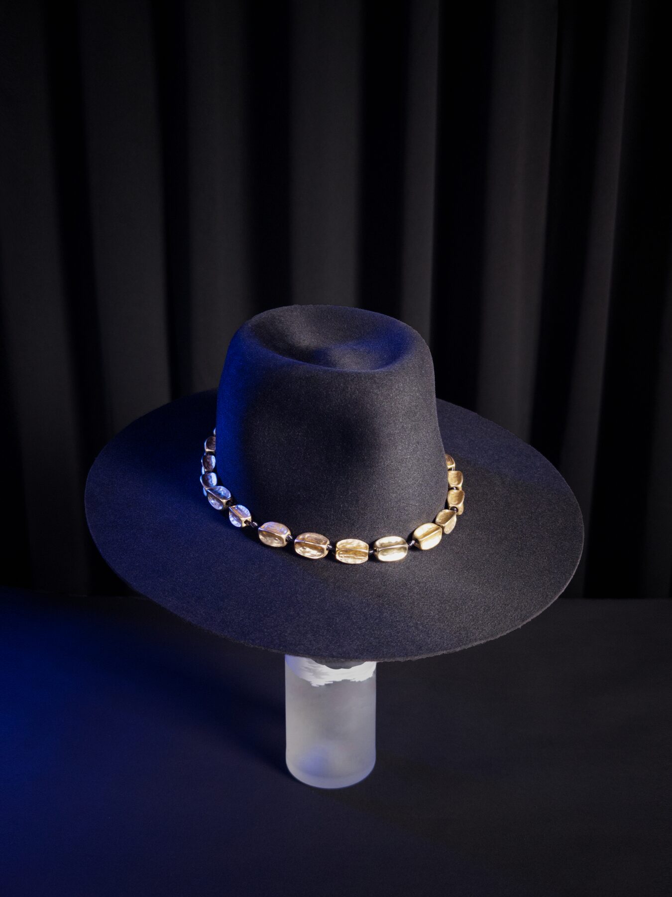 Bespoke fur-felt hat worn, dark editorial portrait — Alta Aura Designs