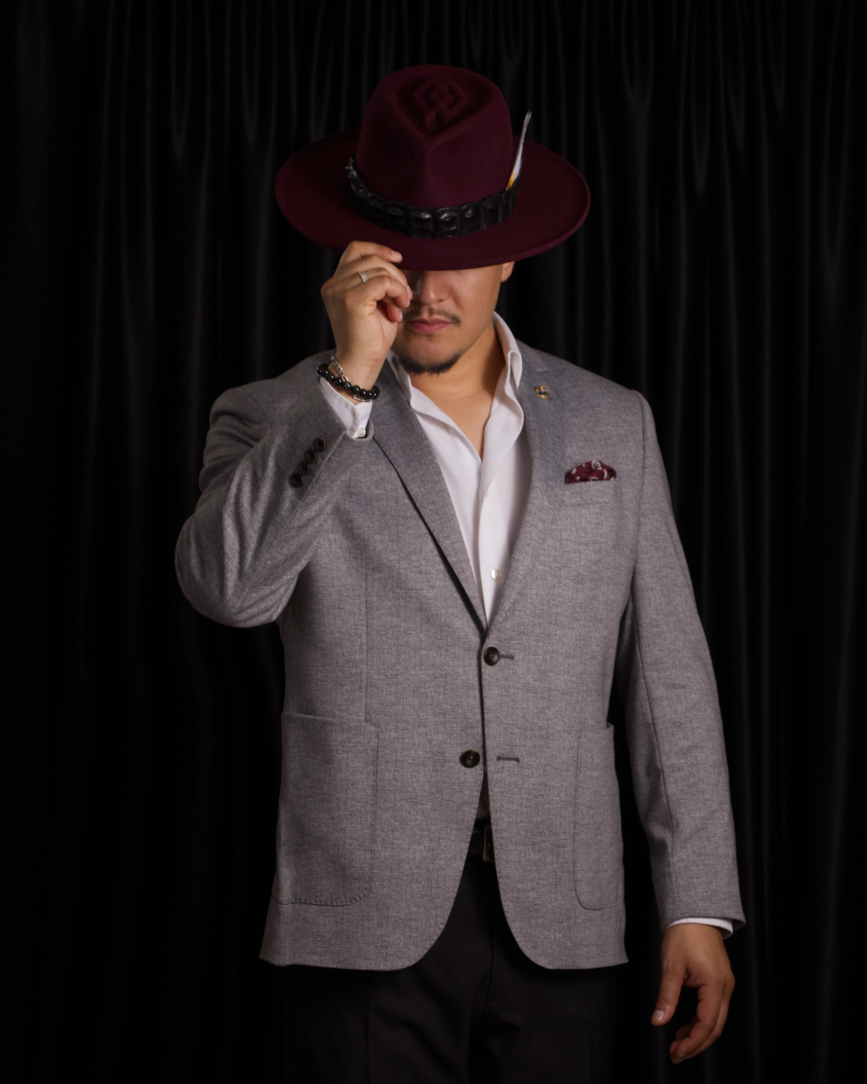 Liobardo, bespoke hatmaker, in a fur-felt hat — Alta Aura Designs