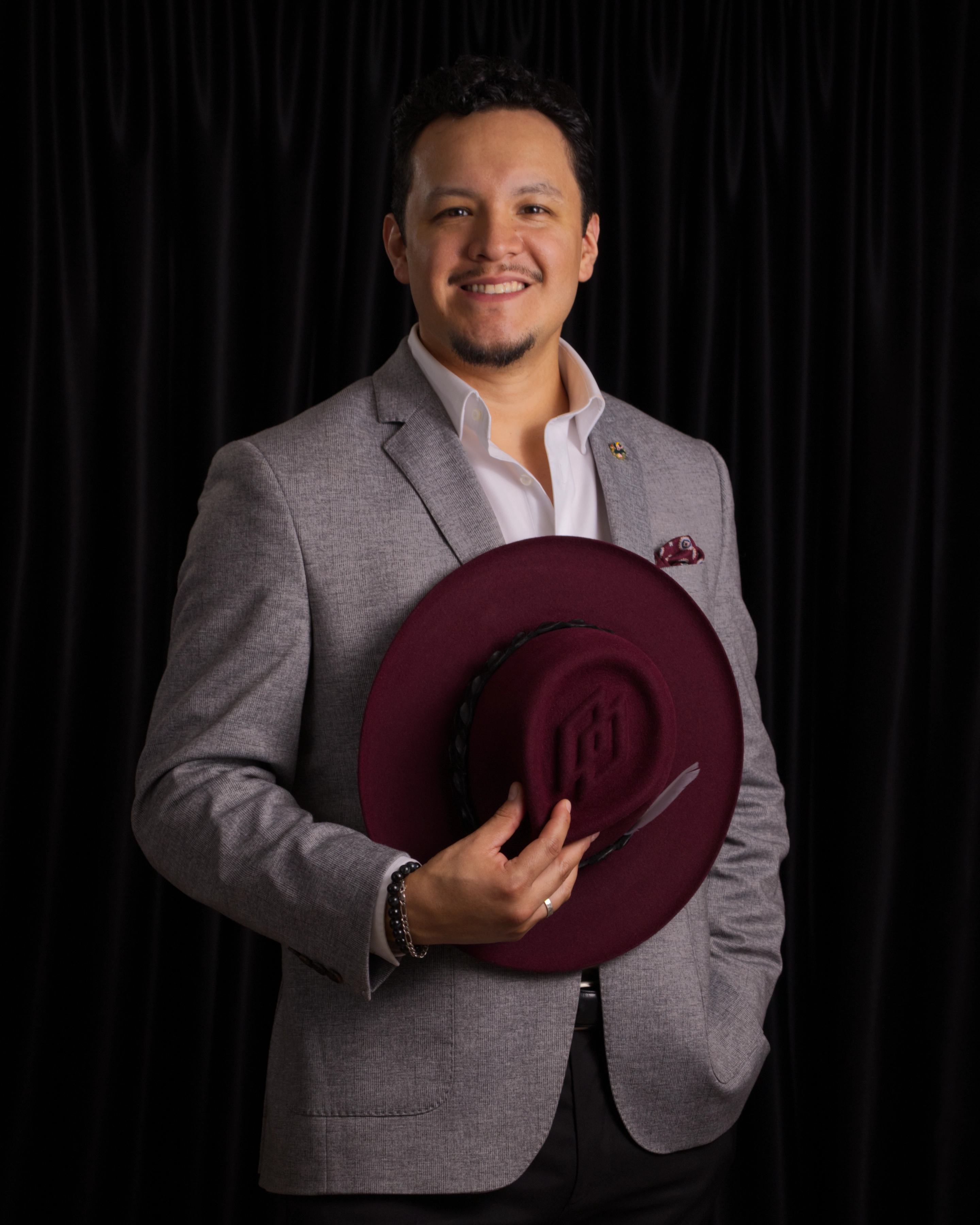 Liobardo, bespoke hatmaker, in a fur-felt hat — Alta Aura Designs