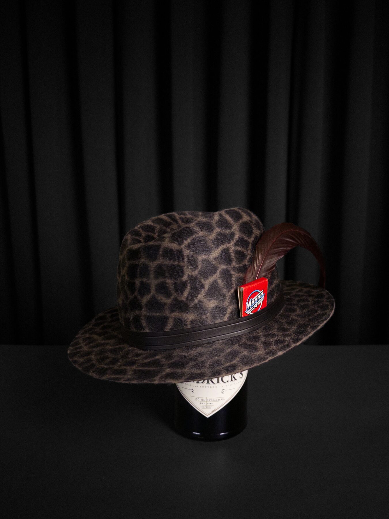 Bespoke fur-felt hat worn, low-key editorial frame — Alta Aura Designs
